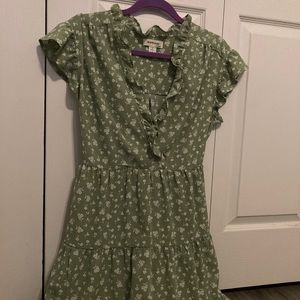 A green, floral dress